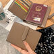 Clip de passeport pour la couverture de protection des passeports pour femmes pour voyager à l'étranger Sac de passeport ID Storage Multi-fonction Carte Multifonction