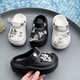 Croton Croton Cave Shoes Cadena de flores de dibujos animados para niños Eva Slippers 2025 NUEVAS Girls Baotou Sandals desgaste en casa al aire libre White 24 -25 tamaños