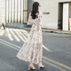 Robe florale mince en V à col en V pour femmes en 2025 Été Nouvelle jupe longue à la taille douce pour les genoux