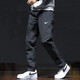 Nike (Nike) pantalones para hombres Summer Nuevos pantalones deportivos al aire libre Pantalones casuales de hombres transpirables delgados pantalones sueltos Pantalones rectos DM6627-010 Secado rápido de secado L