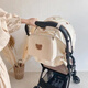 Kinderwagenstasche koreanische Mutter Bag Kinderbeutel Multifunktionaler Mutter und Babybeutel Bärenbeutel Baby Aufbewahrung und wandeln