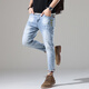 Jeep Spirit Jeep printemps et été brodé jean imprimé pantalon pour hommes slim pieds petits pieds personnalité décontractée mode tombant les jambes larges 869 bleu clair 32 [adapté au poids 140-149jin [Jin est égal à 0,5 kg]]]