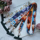 Patrón de Nezha Patrón de Nezha Longitud ajustable Longitud ajustable y colcha corta Crossbody Hanger Rope de doble propósito libera las manos y es conveniente para la imagen completa del mar de Universal Nezha B [One]