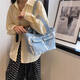 Lienzo de gran capacidad Fashion Bolso informal Bolso 2025 Autumno Nuevo versátil INS ONE-HOLEZA ACARMA BOTA BACK BLANCO