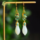 Shixiang earrings suitable for round faces and big faces. Magnolia flower earrings for women. Flowers and Hetian jade in ancient style with Hanfu. Chinese style earrings. EH215-Orchid white jade earrings.