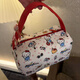 New cartoon cosmetic bag for makeup, washing, portable travel, portable storage, large capacity, cute three-dimensional handbag, red portable kt printed small bag