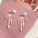 Pink bow imitation pearl earrings for women, light luxury and high-end back-hanging earrings, sweet pierced earrings, earrings, Parisian dance bow-ear clips