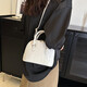 Sac à main en pierre pour les femmes 2025 Nouveau sac de coquille polyvalent rétro de haute qualité sac à bandoulière à une épaule blanc