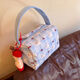 2025 new high-value makeup storage bag large capacity portable washing and storage three-dimensional travel makeup handbag blue pleated puppy handbag