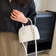 Sac à main en pierre pour les femmes 2025 Nouveau sac de coquille polyvalent rétro de haute qualité sac à bandoulière à une épaule blanc