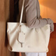 
Nanfeng Chio2nd Solid Color Style Tote Bag Women's 2025 New Commuter Large Capacity Hand-Laundry Shoulder Bag Rice White