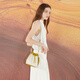 Calvin Klein Kleiner CK modische einfache PU-Bucket-Tasche One-Shoulder Handtasche Kleine Frauen mehrfarbige Senf Tan M Geschenkbox