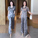 Xin Yimei Fashion Set Damen 2025 Sommerstil Female Abdeckung von Fleisch schlampig Kurzarmhemd Wide Legs Ice Wire Zwei-teiliger grauer XL [Gewicht 111-120jin [Jin gleich 0,5 kg]]