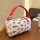 New cartoon cosmetic bag for makeup, washing, portable travel, portable storage, large capacity, cute three-dimensional handbag, red portable kt printed small bag