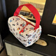 New cartoon cosmetic bag for makeup, washing, portable travel, portable storage, large capacity, cute three-dimensional handbag, red portable kt printed small bag
