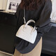 Sac à main en pierre pour les femmes 2025 Nouveau sac de coquille polyvalent rétro de haute qualité sac à bandoulière à une épaule blanc
