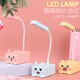 USB plug-in table lamp LED desk lamp mobile phone holder pen holder cartoon desktop ornaments children's gift night light cute little desk lamp kindergarten Children's Day gift cute piglet + plug-in style random color