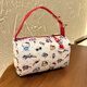 New cartoon cosmetic bag for makeup, washing, portable travel, portable storage, large capacity, cute three-dimensional handbag, red portable kt printed small bag