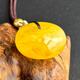 Yuzhi 1 object 1 certificate 1 shot natural Russian chicken fat yellow beeswax safety buckle pendant for men and women amber pendant 5.46g G5528 rare collection about 24*14 mm