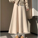 Xi'er hem tassel knitted A-line skirt for women in autumn and winter for small people with drapey large hem umbrella skirt high waist mid-length skirt off-white one size fits all 80-130 Jin Jin is equal to 0.5 kg, skirt length is about 75