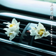 Yusen Yi Magnolia Car Perfume Air Vent Aromatherapy Air Conditioner Car Long-lasting Light Fragrance Car Decoration for Women and Men White Magnolia 1 (free bottle of natural essential oil)