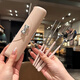 Xinnan primary school student chopsticks and spoon set children's 304 stainless steel portable tableware three-piece set with exquisite storage box for women bow tie tableware three-piece set bean paste powder