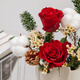 The first snow in winter, roses and pine cones mixed flowers are perfect for Christmas