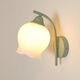 Opu Yuanxing simple bedroom wall light led green bedside lamp cream windshield iron art living room balcony staircase decorative wall light B686 green lily of the valley flower 5 watts warm light