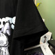 SHANIDOLUO Ropa de verano para mujeres de gran tamaño NUEVO Producto Fat Hermana Fat Slim Pareja de dibujos animados Camiseta de algodón 16835 Black XL Recomendado 100-125Jin [Jin equivale a 0.5 kg] para usar