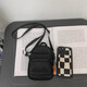 Bolsa de teléfono móvil Mu Jin, bolso cruzado de hombres y mujeres, mini bolso de moda, auriculares de moda de la calle de celebridades de Internet, billetera de monedas clave, negro (con colgante de astronautas)