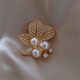 Crystal camellia brooch gift box birthday gift women's shell bead corsage pin buckle suit badge to prevent exposure