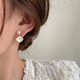 Idel has no pierced ears, shell imitation pearl earrings, new mosquito-repellent disc earrings, women's French retro earrings, shell earrings E2811
