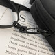 Bolsa de teléfono móvil Mu Jin, bolso cruzado de hombres y mujeres, mini bolso de moda, auriculares de moda de la calle de celebridades de Internet, billetera de monedas clave, negro (con colgante de astronautas)