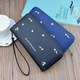 Portefeuille féminin simple en tissu long Zipper à la mode portefeuille brodé 2024 European et américain de grande capacité en cuir souple maintient le sac de téléphone mobile rose