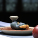 Hidden pot world Yixing purple sand lid holder tea pet pure handmade ornaments tea set accessories frog lotus seeds can be raised tea table tea play small ornaments