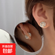 Temperamentless pierced ear clips for women, painless, strong suction magnets, light luxury, high-end niche ear accessories for birthday gifts, golden star-filled diamond ear clips, one pair