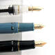 Immortal 698 transparente Demonstration Kolben 14K Gold Pen 004 Schwarzer Sechs-Window-Goldklamm 14K Gold Stift Nib 0,5 0,5 mm