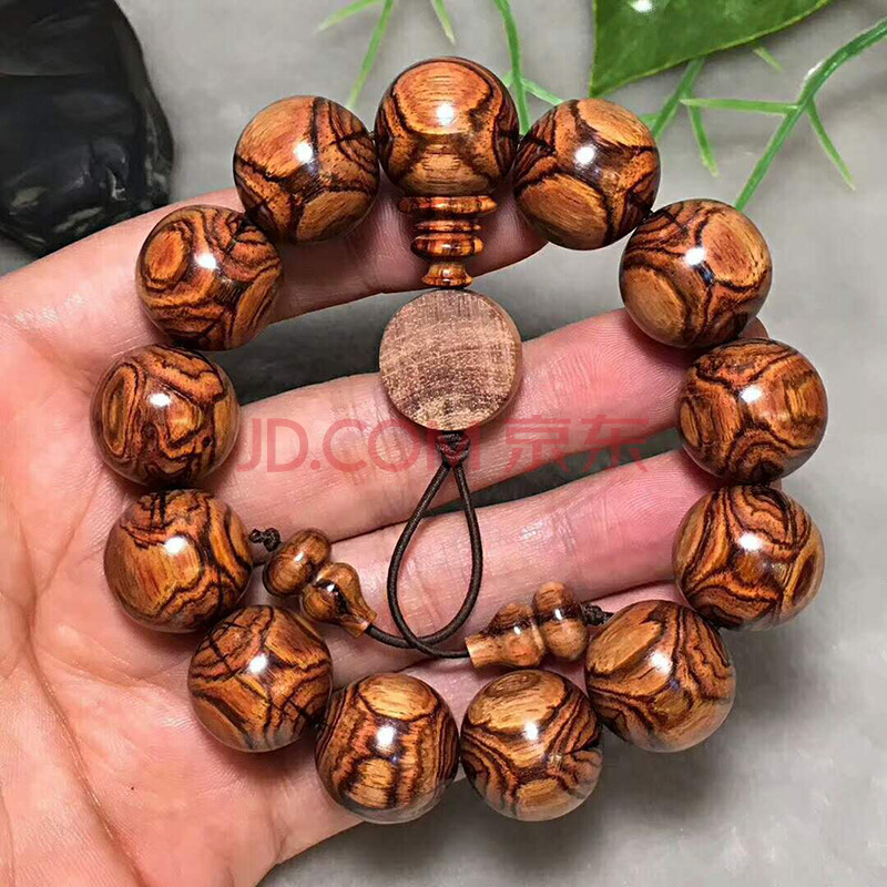 海南黄花梨对眼鬼脸x纹手串1.8cm