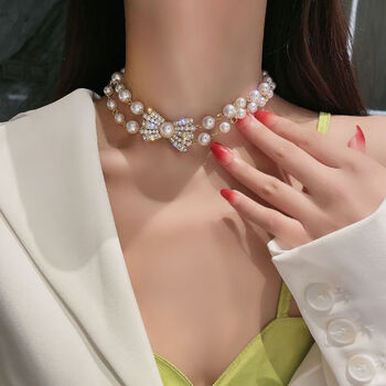 娜塔纳秋冬轻奢长款珍珠毛衣链气质项链女多层锁骨链蝴蝶结珍珠项链