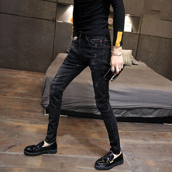 丛集精神小伙紧身裤秋冬潮男精神小伙黑色紧身牛仔裤修身小脚休闲裤