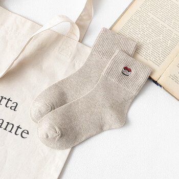 欧瑾(oujin)袜子女批发全棉中筒袜休闲卡通笑脸头像刺绣女袜地摊货源