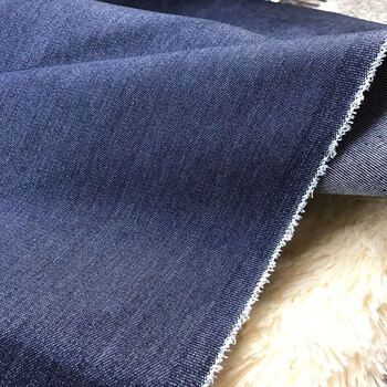 牛仔布料加厚弹力纯棉水洗牛仔裤布料diy布料薄牛仔布料 中蓝色低弹