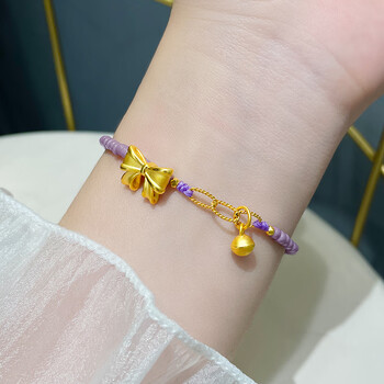 禧臣黄金蝴蝶结在逃公主手链女999足金铃铛转运珠紫色编织手串2022年