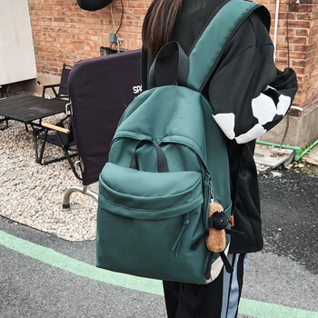 尼阑nilan书包女中学生初中高中女生双肩包简约纯大学生轻便背包绿色
