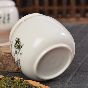 臻艺 中号陶瓷迷你高档茶叶罐茶罐 密封小号铁观音普洱茶缸便携储茶罐 水点桃花