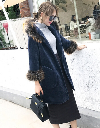 女装 皮草 木宸(muchen) 鲜诺2017秋冬新款带帽貉子领女羊剪绒皮草
