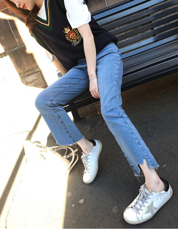 秋季新款韩版高腰不规则毛边微喇黑色牛仔裤女宽松学生显瘦九分 蓝色