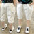 馨迪芭（XINDIBA）男童夏季外穿适合4-13岁小男孩休闲裤儿童中大童时尚帅气牛仔裤子 后白标【白色】 身高130厘米左右