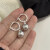 ZDCK新耳环女小众法式年新 银色耳圈 灰色珍珠