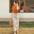 TKBQ凉感t恤女士短袖2024夏天衣服女装夏季新款减龄圆领T恤高腰半身裙 两件套橙色T恤杏色半身裙  M 建议85-100斤